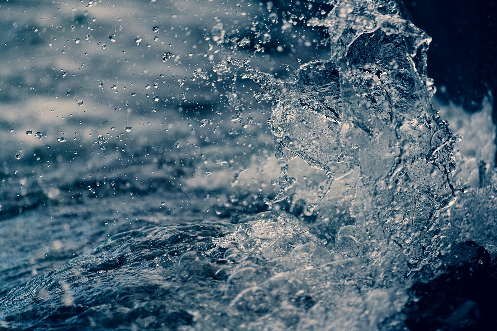 Fluid Dance High-speed capture of water shows droplets suspended in a dynamic burst.