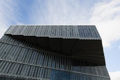 Library Overhang Cantilevered glass facade of the Deichman Bjørvika Library viewed from below in Oslo.