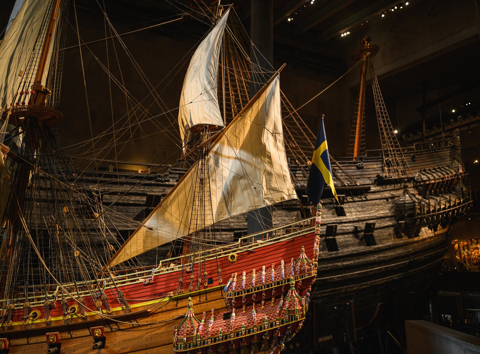 Maritime Majesty A detailed scale model of the 1628 Vasa warship stands before the preserved original hull inside Stockholm’s Vasa Museum.