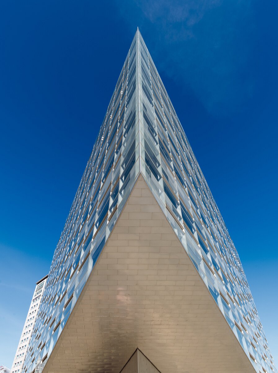 Sharp Geometry Sharp glass wedge of Krystallen office building pointing skyward in Copenhagen.