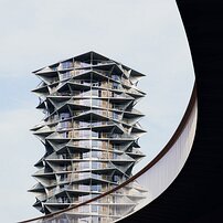 Spiky Tower Faceted Kaktus Tower is framed by a sweeping pedestrian ramp in Copenhagen.